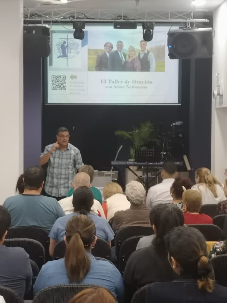 Pastor Adam Nathanson teaching a Prayer Seminar in Venezuela
